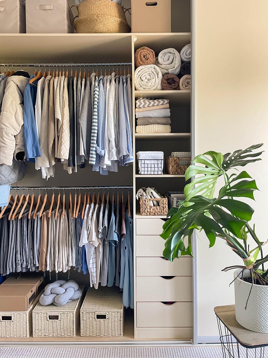 Decluttering, organizing and tidiness in closet. Storage for apparel, socks and shirts.